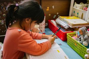 Girl practicing numbers